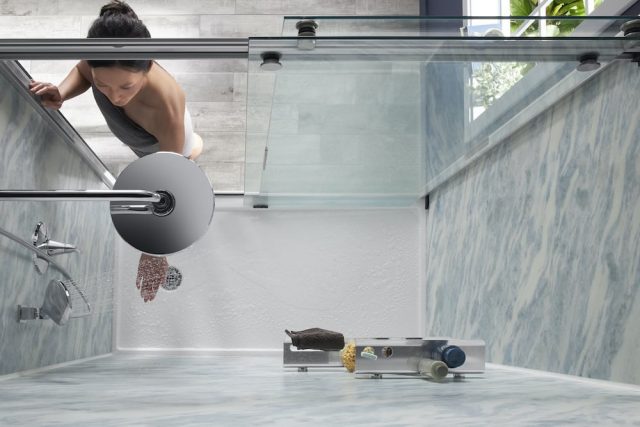 Aerial view of woman in shower with Cintilante Bluette walls