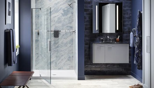 blue shower with pivoting glass door