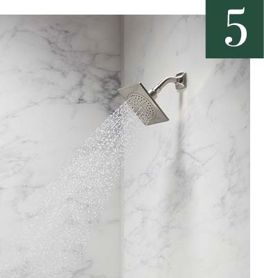 Calacatta Crema Contemporary shower walls with Polished Chrome showerhead