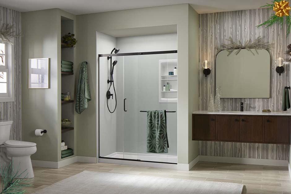 Holiday decorated bathroom featuring LuxStone shower with Ice™ Grey shower walls and Matte Black hardware.