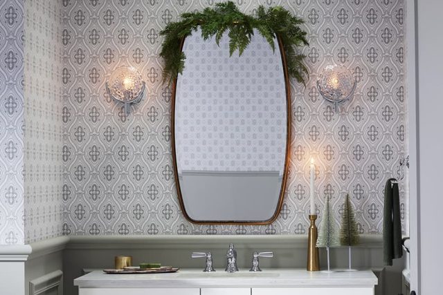 Bathroom vanity with holiday decor and candles'