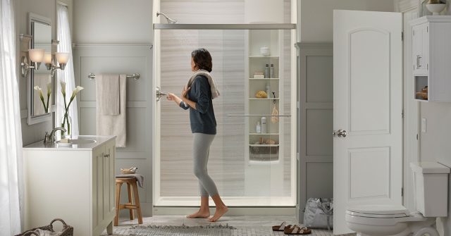 woman entering shower'