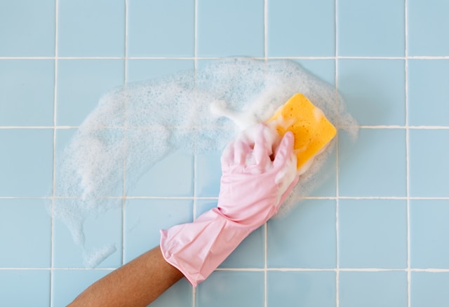 scrubbing tile shower