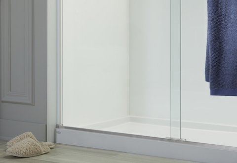 view of glass shower sliding door style