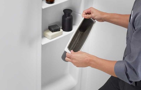 installer adding final touches to shower install process