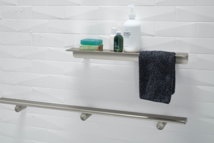 the floating shelf installed above the shower barre