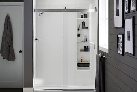 Shower with a Glass Door and Shelves | KOHLER® LuxStone Shower